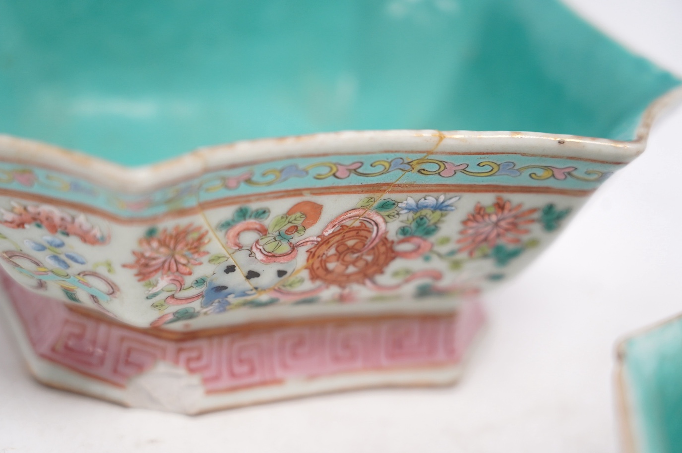 A Chinese famille rose octagonal bowl and another, both Tongzhi mark and period (1862-1874), largest 16cm wide. Condition - rectangular dish is damaged, bowl is fair, chip to the top rim